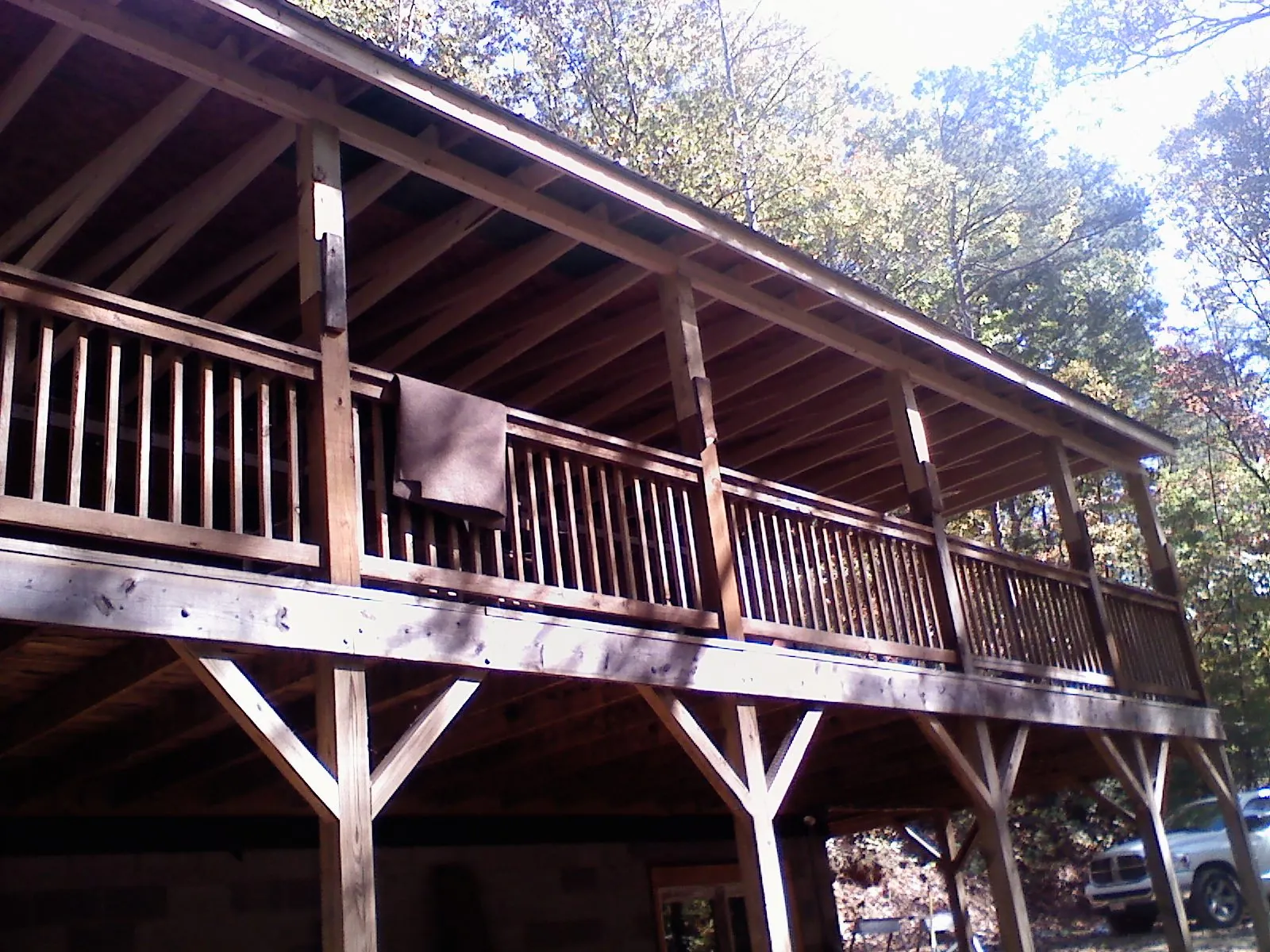 Timber framing under a new elevated porch and deck — Roof Leak Repair in San Bernardino by Roofing Brothers